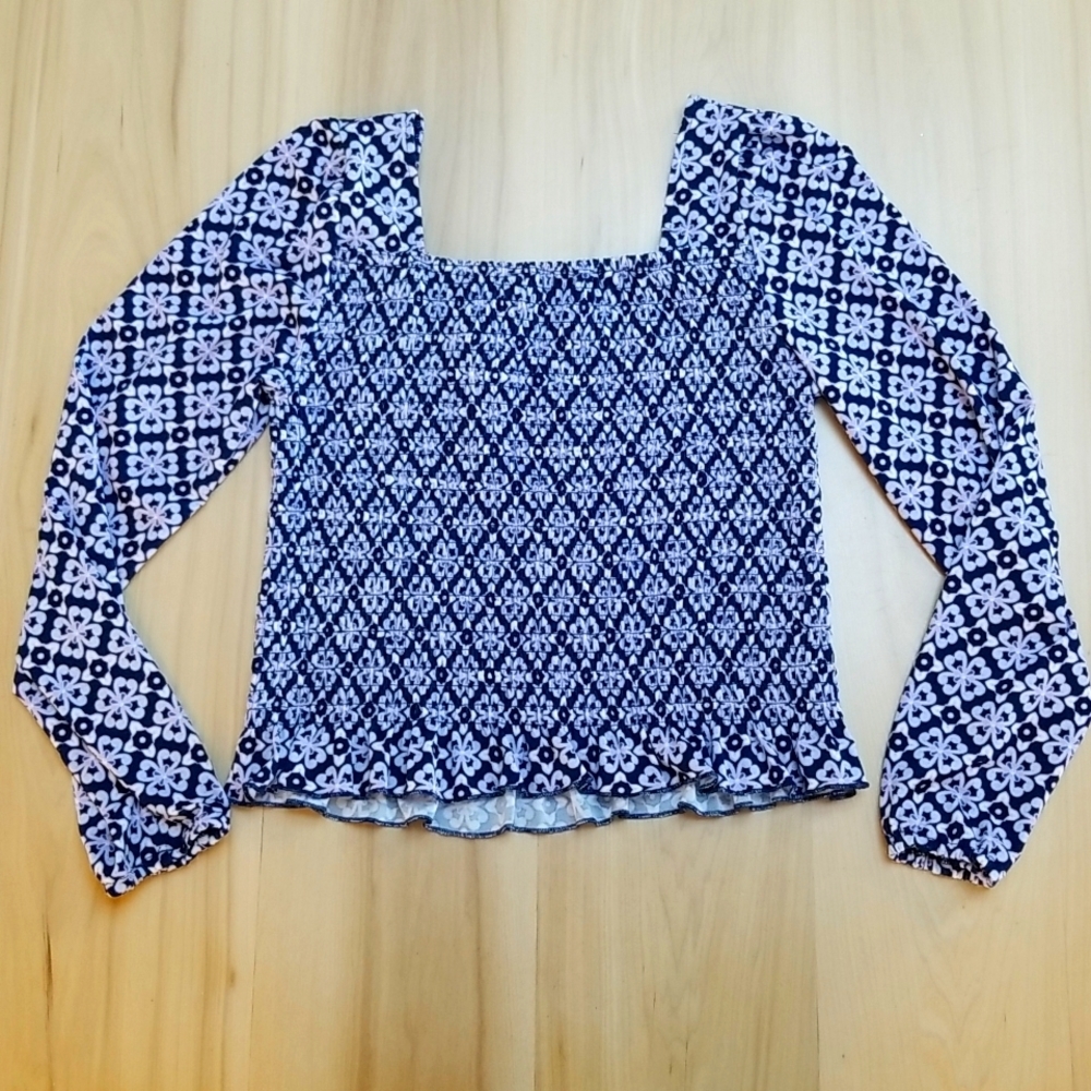 Lark + Grey Smocked Crop Top With Ruffled Hem.